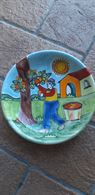 Piatti in ceramica decorati a mano Nino Parrucca