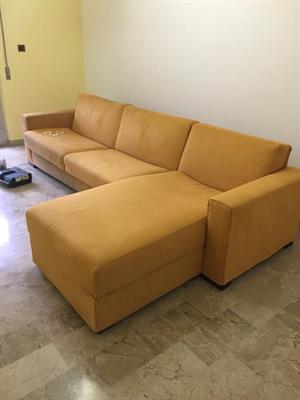 Divano letto matrimoniale con penisola contenitore