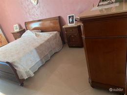Camera da letto stile classico