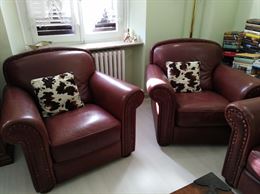 Divano e due poltrone in pelle Natuzzi