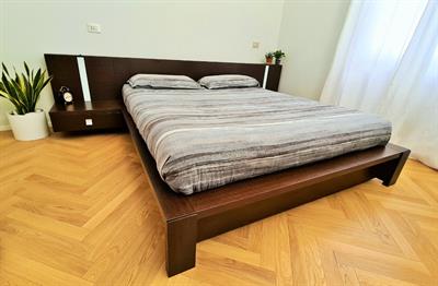 Letto matrimoniale contenitore Saturno in rovere moro