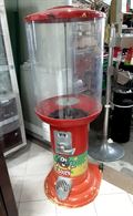 Distributore di palline con gettoniera