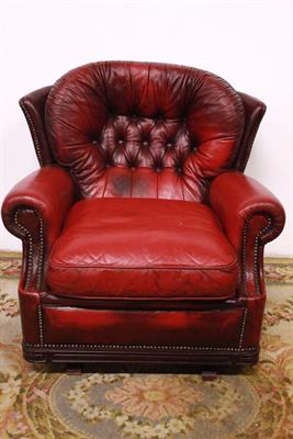 Poltrona a dondolo in pelle bordeaux