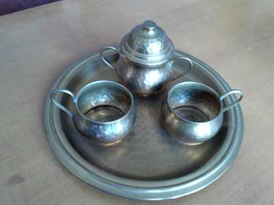Tris in Ottone