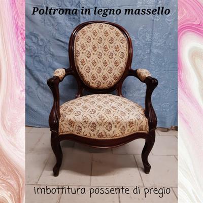 Poltrona imbottita in legno massello